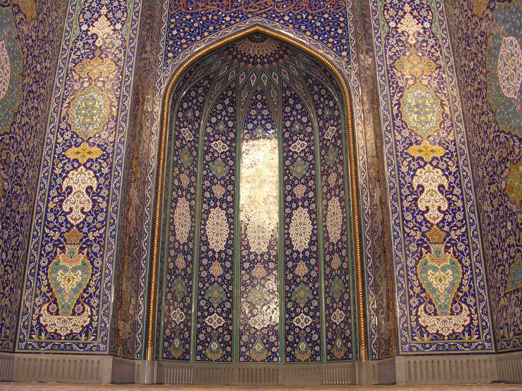 Muscat 04 Grand Mosque 07 Mihrab In the eastern end of the main prayer hall, made of finest ceramics and marble, is the mihrab, a niche in the wall facing Mecca, indicating the qibla, the direction believers should face while praying.